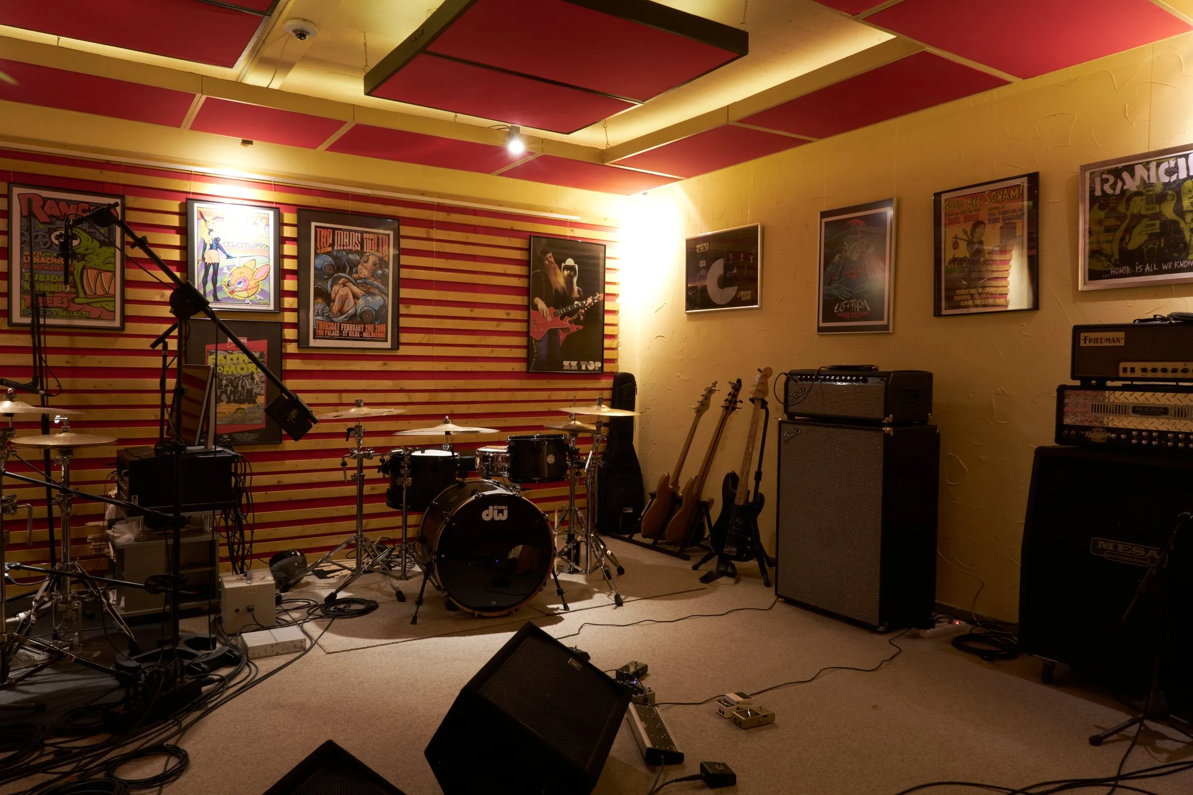 Live room with drums and amps
